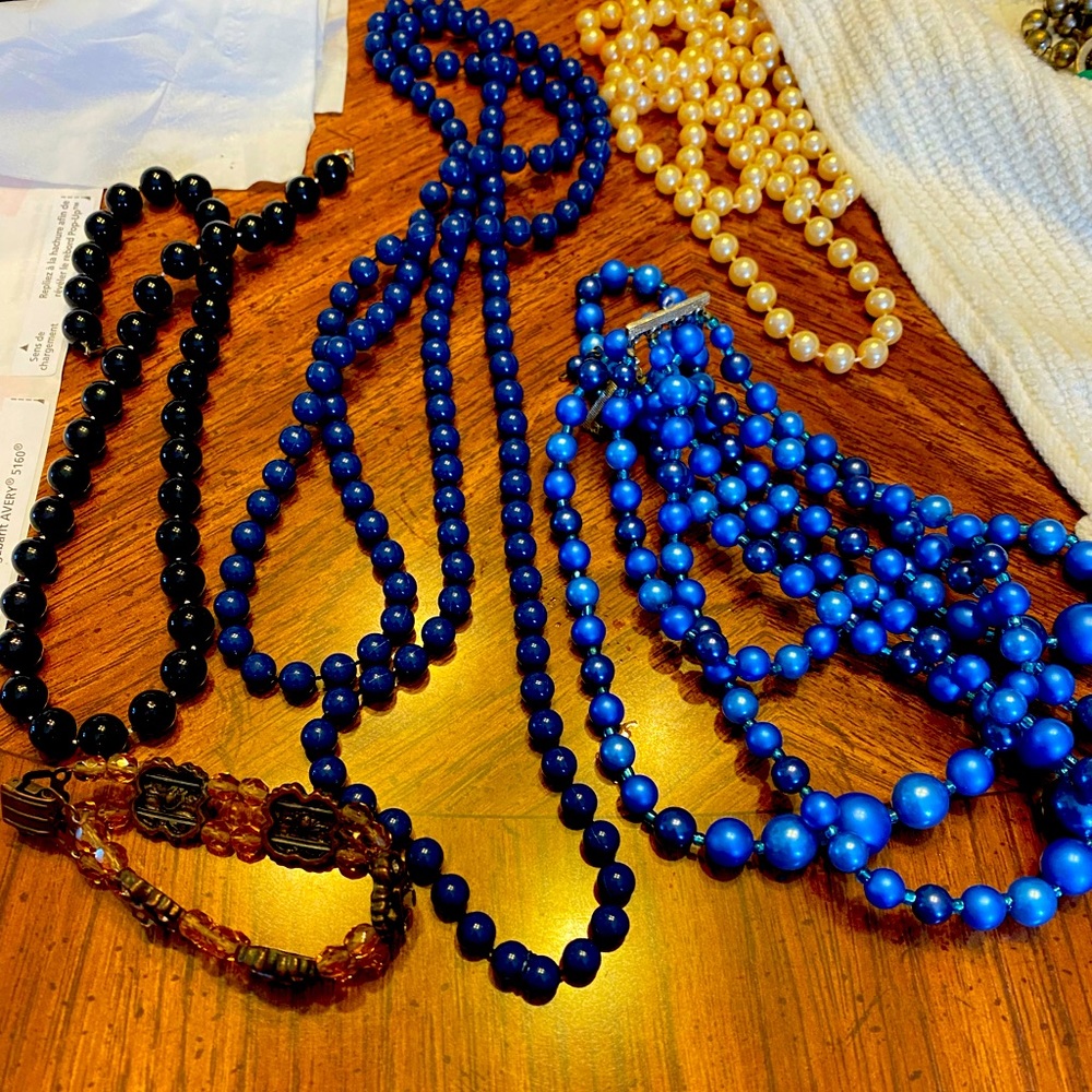4 necklaces and 1 bracelet